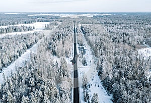 Aerial view of snow covered road in winter. Winter landscape