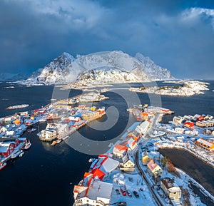 Aerial view of snowy fishing village in Norway in winter