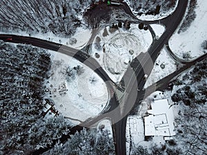 Aerial view snowy forest and road Winter landscape