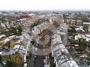 Aerial view of snowy London suburb in winter