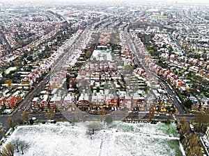 Aerial view of snowy London suburb in winter