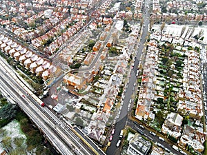 Aerial view of snowy London suburb in winter