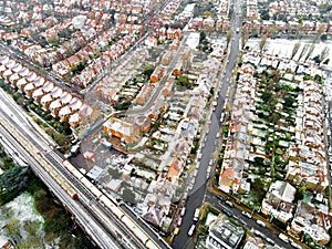 Aerial view of snowy London suburb in winter