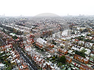 Aerial view of snowy London suburb in winter