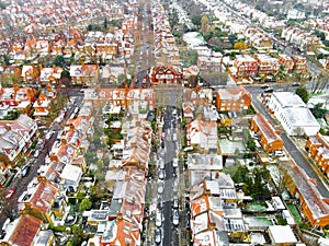 Aerial view of snowy London suburb in winter