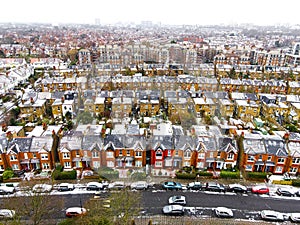 Aerial view of snowy London suburb in winter