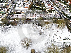 Aerial view of snowy London suburb in winter