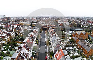 Aerial view of snowy London suburb in winter