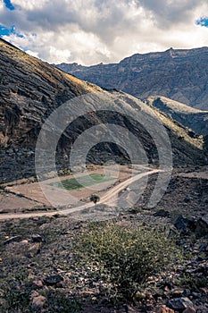 Aerial view of the soccer field used in an Audi ad between mountains in Jebel Shams, Oman