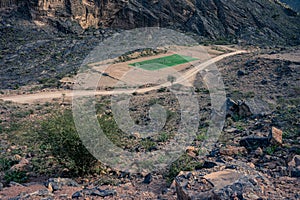 Aerial view of the soccer field used in an Audi ad between mountains in Jebel Shams, Oman