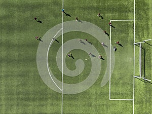 Aerial view of a soccer field with young league players