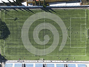 Aerial view of a soccer field with young league players