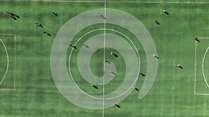 Aerial view of a soccer field with young league players