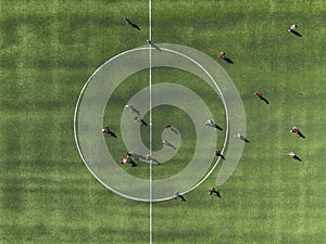 Aerial view of a soccer field with young league players