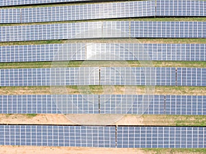 Aerial view of solar panels In the electric industry. Green energy that can be renewable for environment. Solar power alternative