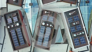 Aerial view of the solar panels on the roof of modern building