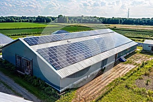 Aerial view of solar panels on the roof of a modern industrial building, generative ai