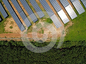 Aerial view of solar panels In solar station the electric industry. Green energy that can be renewable for environment. Solar