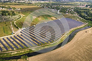 Aerial view of solar power plant. Electric panels for producing clean ecologic energy