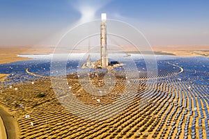 Aerial view of a Solar power tower and mirrors.