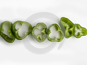 Aerial view of some cuts of green peppers photo