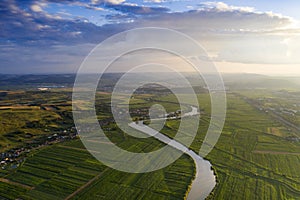 Aerial view of the Somesul river shore in summer, Dej, Romania