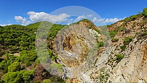 Aerial view of Sousaki extinct volcano of the Hellenic Volcanic Arc, Corinthia, Greece. Colourful rocks and ash and interesting ge