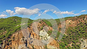 Aerial view of Sousaki extinct volcano of the Hellenic Volcanic Arc, Corinthia, Greece. Colourful rocks and ash and interesting ge