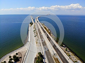 The aerial view of the south entrance to the fishing pier near Bob Graham Sunshine Skyway Bridge at St Petersburg, Florida, U.S.A