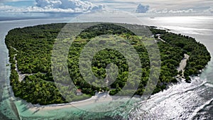 Aerial view of the southern atolls of Maldives with lush foliage