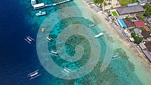 Aerial view of speed boat and beautiful sea beach at top view on summer, Luxury island paradise for tourism travel on
