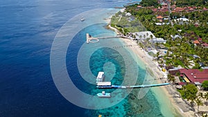 Aerial view of speed boat and beautiful sea beach at top view on summer, Luxury island paradise for tourism travel on