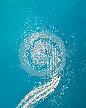 aerial view of speed boat in blue sea water