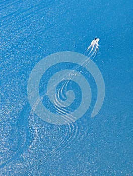 Aerial view of speedboat in full tour