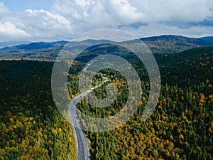 aerial view of speedway road in autumn carpathian mountains