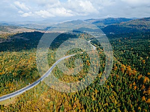 aerial view of speedway road in autumn carpathian mountains