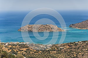 Aerial view of Spinalonga island Venetian fortress and Mirabello bay at dawn, Lasithi prefecture, Crete, Greek Islands