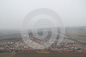 Aerial view of Spis castle with grey sky on background, Slovakia