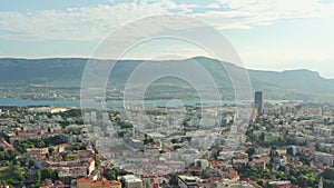 Aerial view Split Croatia. Seaside town in the mountains, houses with red roofs