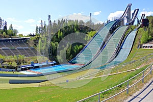 Aerial view of sports centre with three ski jump towers in the summer, Lahti, Finland