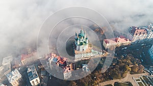 Aerial view of St. Andrew`s Church in heavy fog, Kiev, Ukraine