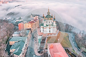 Aerial view of St. Andrew's Church and St. Andrew's Descent in heavy fog, Kiev, Ukraine