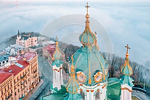 Aerial view of St. Andrew's Church and St. Andrew's Descent in heavy fog, Kiev, Ukraine