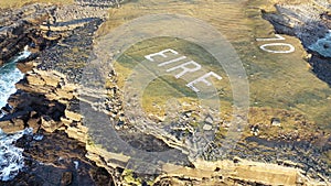 Aerial view of St. John`s Point and the Eire 10 marking next to the lighthouse, County Donegal, Ireland