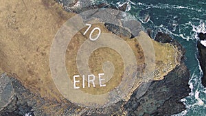 Aerial view of St. John`s Point and the Eire 10 marking next to the lighthouse, County Donegal, Ireland
