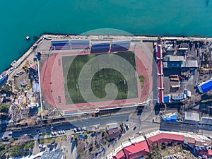 Aerial view of the stadium by the sea.