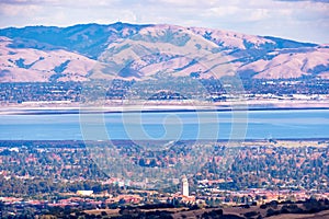 Aerial view of Stanford University amd Palo Alto, San Francisco Bay Area; Newark and Fremont and the Diablo mountain range visible