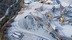 Aerial view of stock pile and conveyors sorting gravel at stone quarry