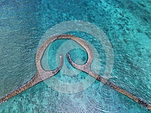 Aerial view of stone tidal weirs in Penghu, Taiwan photo