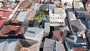 Aerial View of Stone Town, Zanzibar City, Slum Roofs and Poor Streets, Africa
